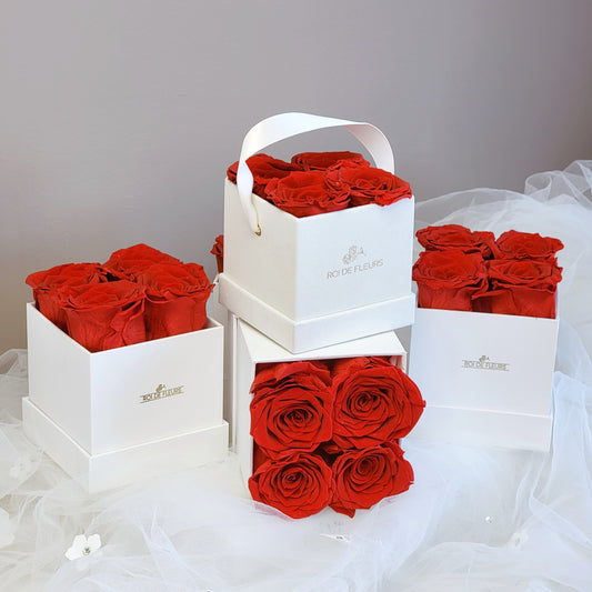 Four Preserved Red Roses in White Classic Hat Box