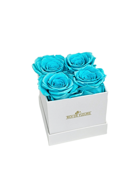 Four Teal Roses in White Classic Hat Box