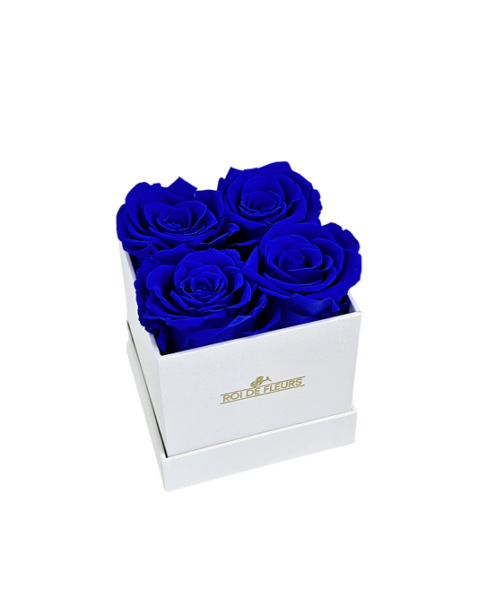 Four Blue Roses in White Classic Hat Box